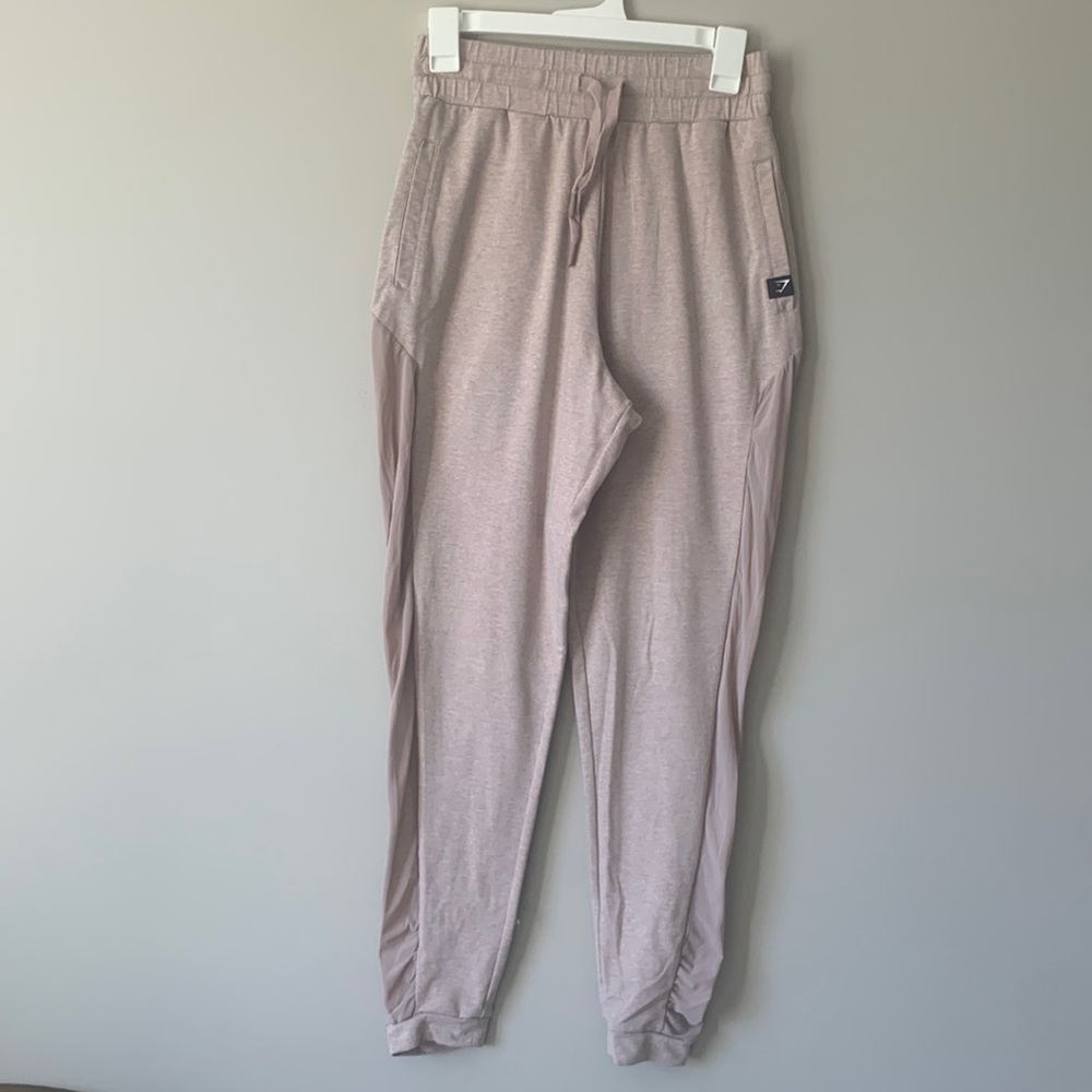 Gymshark light pink sweatpants with mesh detailing (part of matching set)